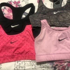 Nike Sports Bras in Black, Hot Pink, Light Pink, and Gray